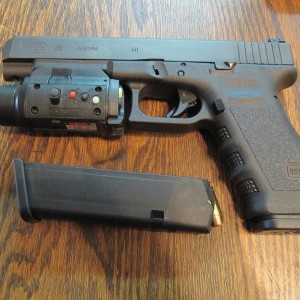 Glock 35 in 40 cal w/SIG nitelight and Lazer