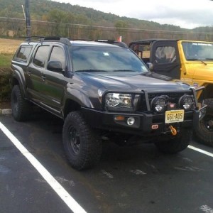 My buddy's 2011 trd offroad. 3"lift 285s