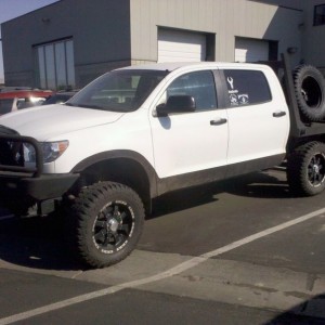 This guy also has a Tacoma DC with a flat bed and 6" lift