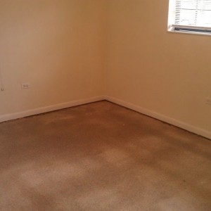 a shame... terrazzo under but busted up by tack strips :/