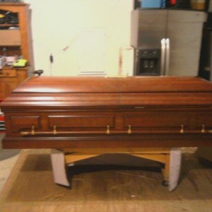 My uncles real coffin he got for halloween. Im helping him put the hinges o