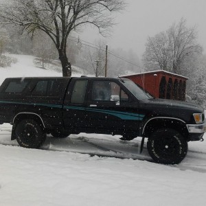 My first snow with blackie! Needed the 4x4 on the back road :-) freaking lo