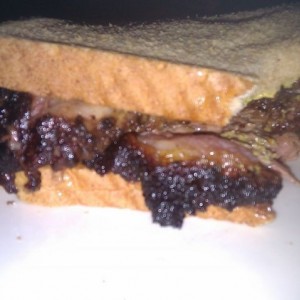 Slow cooked Briskets on whole wheat bread with a little bit of spicy brown 