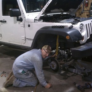 Boss man installing OME lift on his toy