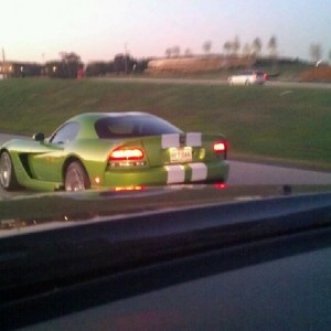 Can't get a good picture, but she is hotter than the car.