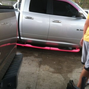 Pink nerf bars and a silver truck Wtf?