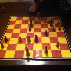 Trying to teach my 7 yr old son how to play Chess and I think he's alr