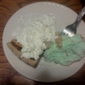 Pumpkin pie covered in whipped cream and home made pistachio pie by me LOL
