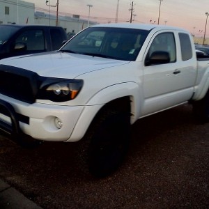 Member wareagle(manynumbers)'s old Tacoma on the lot after trading it 