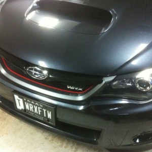 :drool: brother added a red stripe to his WRX grille, wonder what it would 