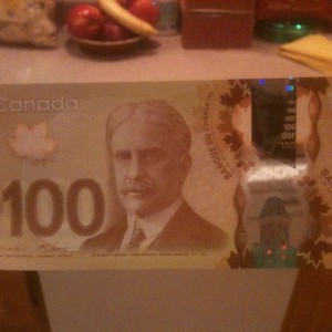 First time I've got my hands on one of our new plastic $100 bills . Ma