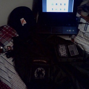 5.11 Tac series Rapid Assault shirt with Mil-Spec Monkey Patches and a hat.