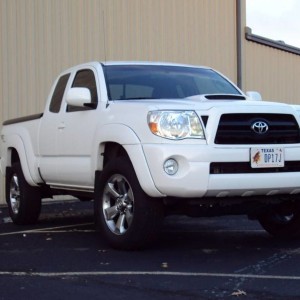 Posing White TRD Sport Access Cab