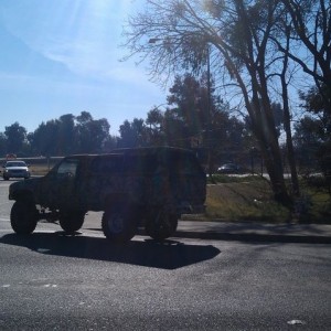 Can't really see it but full army camo Toyota