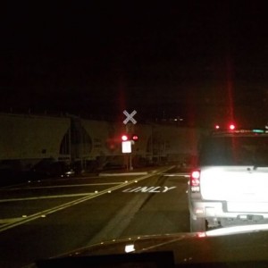 Hey, conductor! It says right there on the sign "Do Not Stop On Tracks