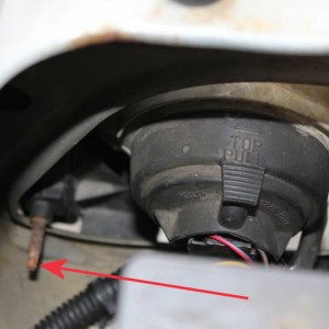 Driver side Headlamp adjustment screw
