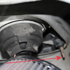 Passenger side Headlamp adjustment screw