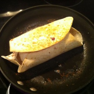 A burrito for the ages...sliced filet mignon, 1 egg, 5 strips of bacon, che