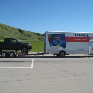 Note the tires hanging over the edge. Access cabs barely fit, but they do.