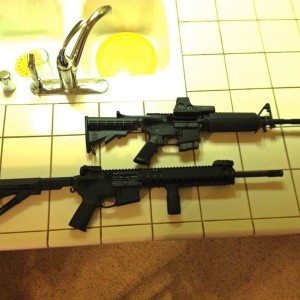 On top - step dad's 6.8mm Stag Arms AR-15 with EOTech Holographic. On 