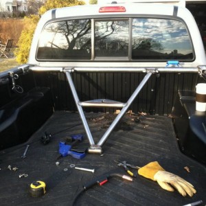 Tire carrier/bed bars