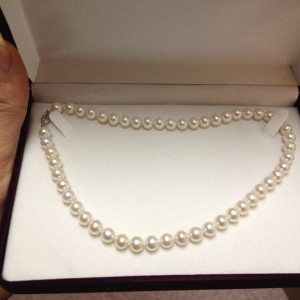 15.5" Japanese saltwater pearls with 14k white Gold clasp. Got the hoo