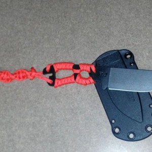 It needed a better color of paracord and a lanyard at the end of it.