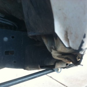 Pre fiberglass, body mount chop and beating pinch welds.