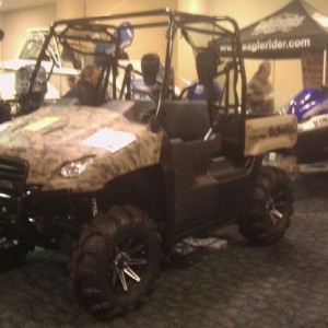3" lift, rims tires, locked front and back, camo, 5 point harness, I r