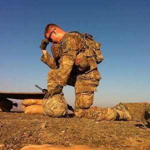 Tebowing on a mountain in Afghanistan
