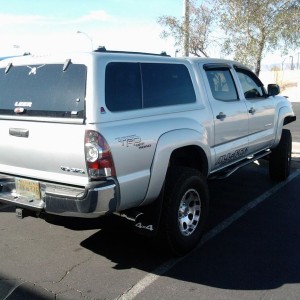 In front of 4 wheel parts has alaska plates