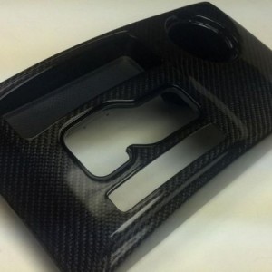 Carbon fiber console with gloss black trimming