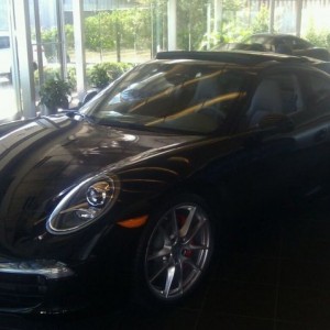 2012 911 Carrera S. MSRP 112,000 dealer can't even sell it yet because