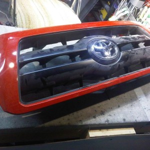 Got an OEM Rad Red grill today... :drevil: got some fancy plans for this on