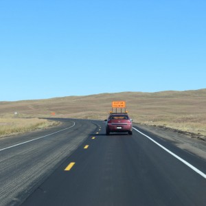 behind the pilot car venturing east into sandhills on N-2