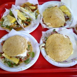 I am laughing a lot while I eat my tacos, spicy pork tacos with nice sweet 