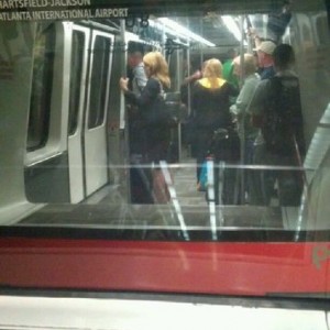 Working the pole on the airport train.