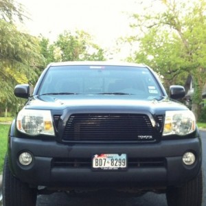 Front end with new horizontal all black grill with Toyota emblem