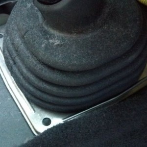 Two back ones were bolts, fronts are clips, just press center to release