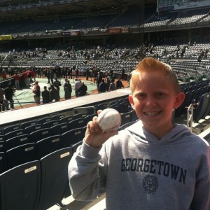 My son got a ball during Angels batting practice at Yankees home opener fro