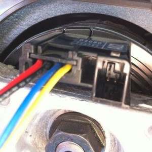 Anyone know how to unclip this clock spring wire?