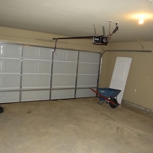 Garage is a little small, truck and car fit. Will have to put up shelves fo
