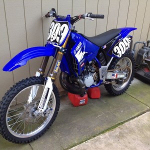 Step-Brothers new '04 YZ 250. Cost him $2K... It's incredible