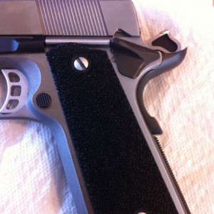 Filed the frame and fitted the grip safety my self. Now I just got to blend