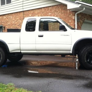 My truck before and after spray painting rims.