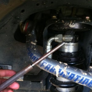 Screw the $40 spanner wrenches. $5 for a punch tool at harbor freight works