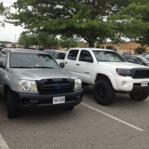 Parked next to superwhite10 truck at the mall my truck looks tiny haha