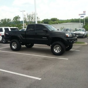 At my local dealer. 6" pro comp lift. Nitto Terra 