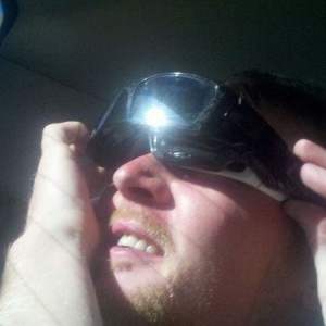 Checking out the eclipse the cheap way. 5 pairs of sunglasses.