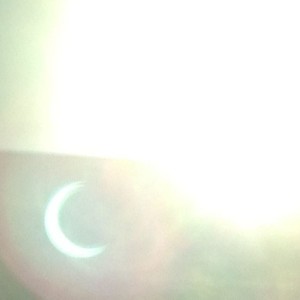 2012 Solar Eclipse. Crappy view, iPhone through DSLR.